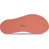 The textured orange-brown rubber outsole of a Teva shoe, featuring a geometric tread pattern and the embossed 'TEVA' logo, shown against a white background. - Teva Original Universal Sandals (Women's) - Burnt Olive Multi