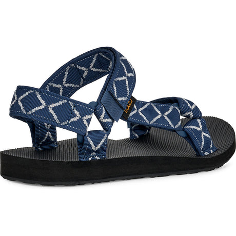 A single Teuila sandal shown from a side profile view against a white background. The sandal features navy blue woven straps with a white geometric diamond pattern, a black textured footbed, and a black outsole. - Teva Original Universal Sandals (Men's) - Diamond Olive