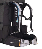 Close-up of the back and hip compartment of a black One Planet hiking backpack, showing padded shoulder straps, a hydration tube, mesh ventilation panels, and a gray adjustable hip belt on a white background. - One Planet Tussock 60L Pack - Black