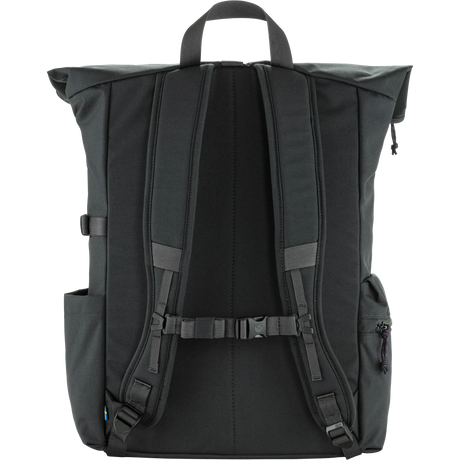 The back view of a black roll-top backpack, showing the padded shoulder straps, central back panel, side pockets, and top carry handle against a solid white background. - Fjällräven Vardag Foldsack 25 - Coal Black