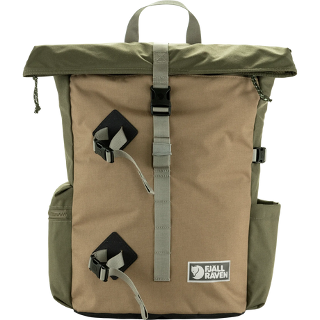 A Fjall Raven roll-top backpack in olive green and tan canvas, featuring a central vertical strap with a black buckle, two diamond-shaped black and gray quick-release buckles, side pockets, and a top carry handle on a white background. - Fjällräven Vardag Foldsack 25 - Green/Clay