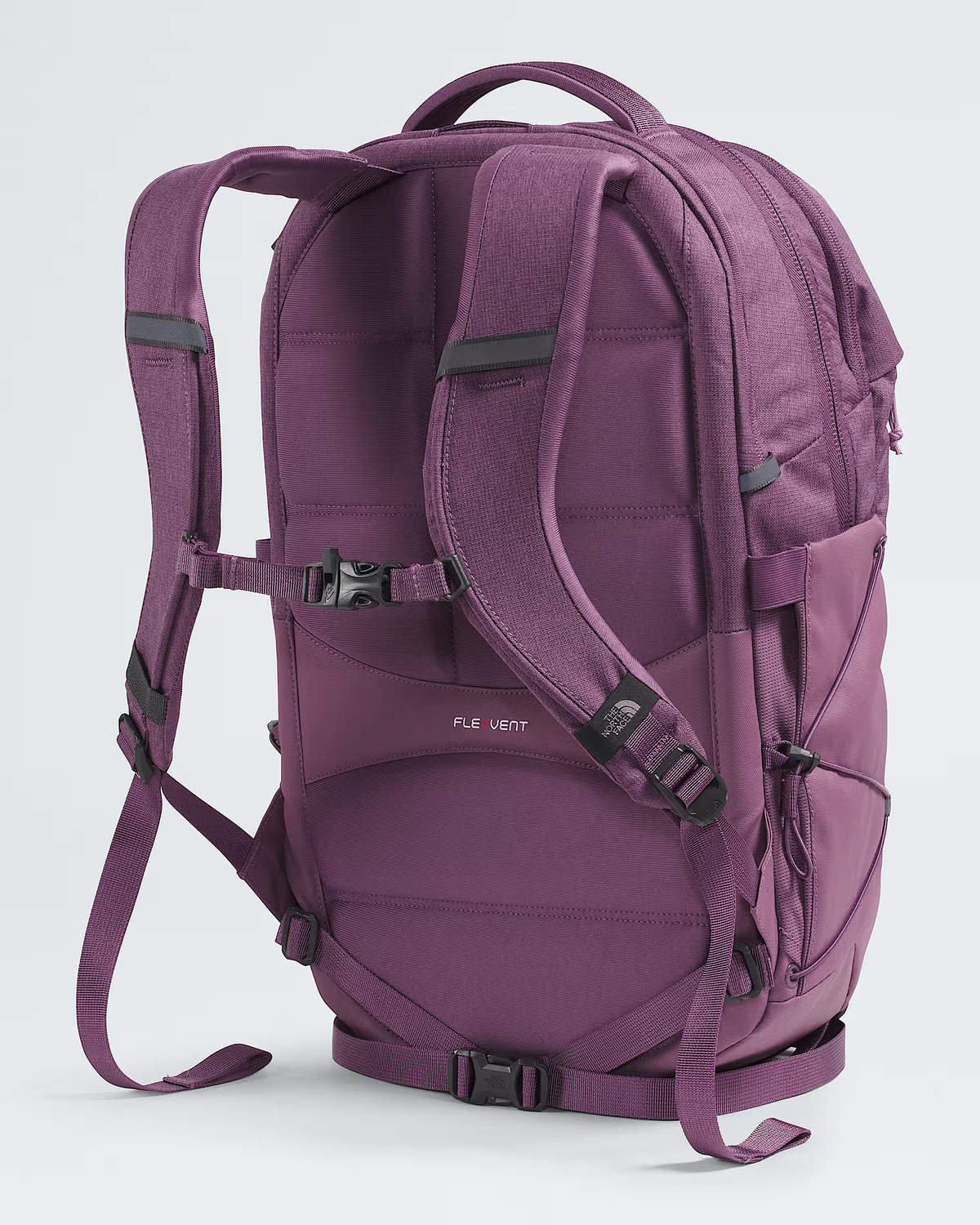A purple Fly Light backpack shown from the back, featuring padded shoulder straps, compression buckles, and a top carry handle on a light gray background. - The North Face Borealis Backpack (Women's) - Chroma Purple Light Heather/Hushed Lavender