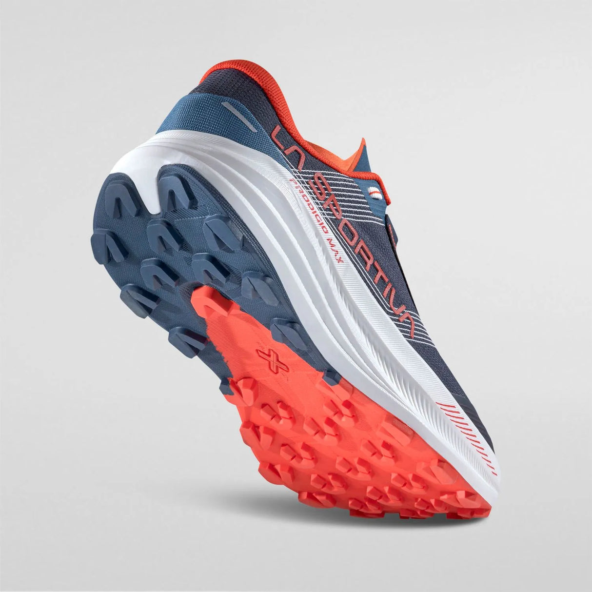 Blue and red running shoe with textured sole on a gray background - La Sportiva Prodigio Max Shoes (Men's) - Night Sky/Mountain Red