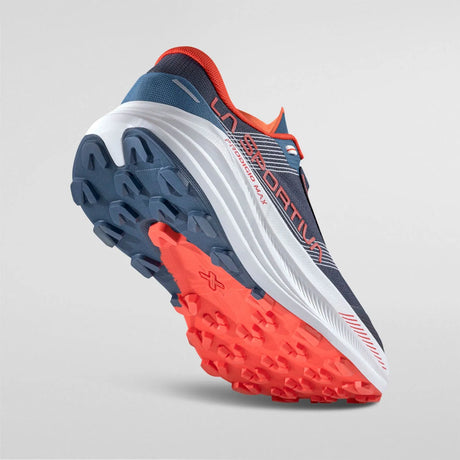 Blue and red running shoe with textured sole on a gray background - La Sportiva Prodigio Max Shoes (Men's) - Night Sky/Mountain Red