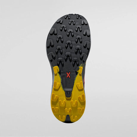 Close-up of a shoe sole with yellow and black tread pattern on a gray background - La Sportiva Prodigio Max Shoes (Men's) - Black/Yellow