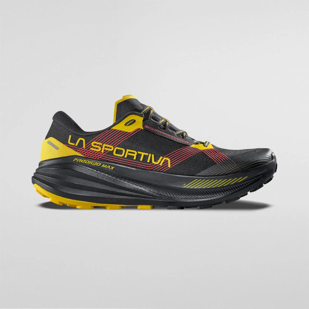 Black and yellow running shoe with 'La Sportiva' branding on a gray background - La Sportiva Prodigio Max Shoes (Men's) - Black/Yellow