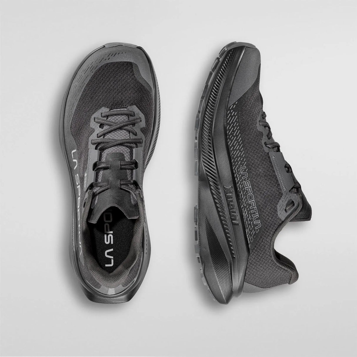 A pair of dark gray and black La Sportiva Merzli running shoes, shown from the top and side views on a light gray background. - La Sportiva Prodigio 2 GORE-TEX Shoes (Men's) - Black/Reflective