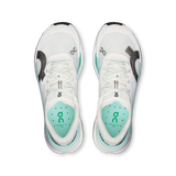 A pair of On Cloudrunner CX running shoes shown from a top-down view, featuring a white mesh upper with mint green and black accents. - On Cloudultra Pro Shoes (Women's) - Ivory/Celeste