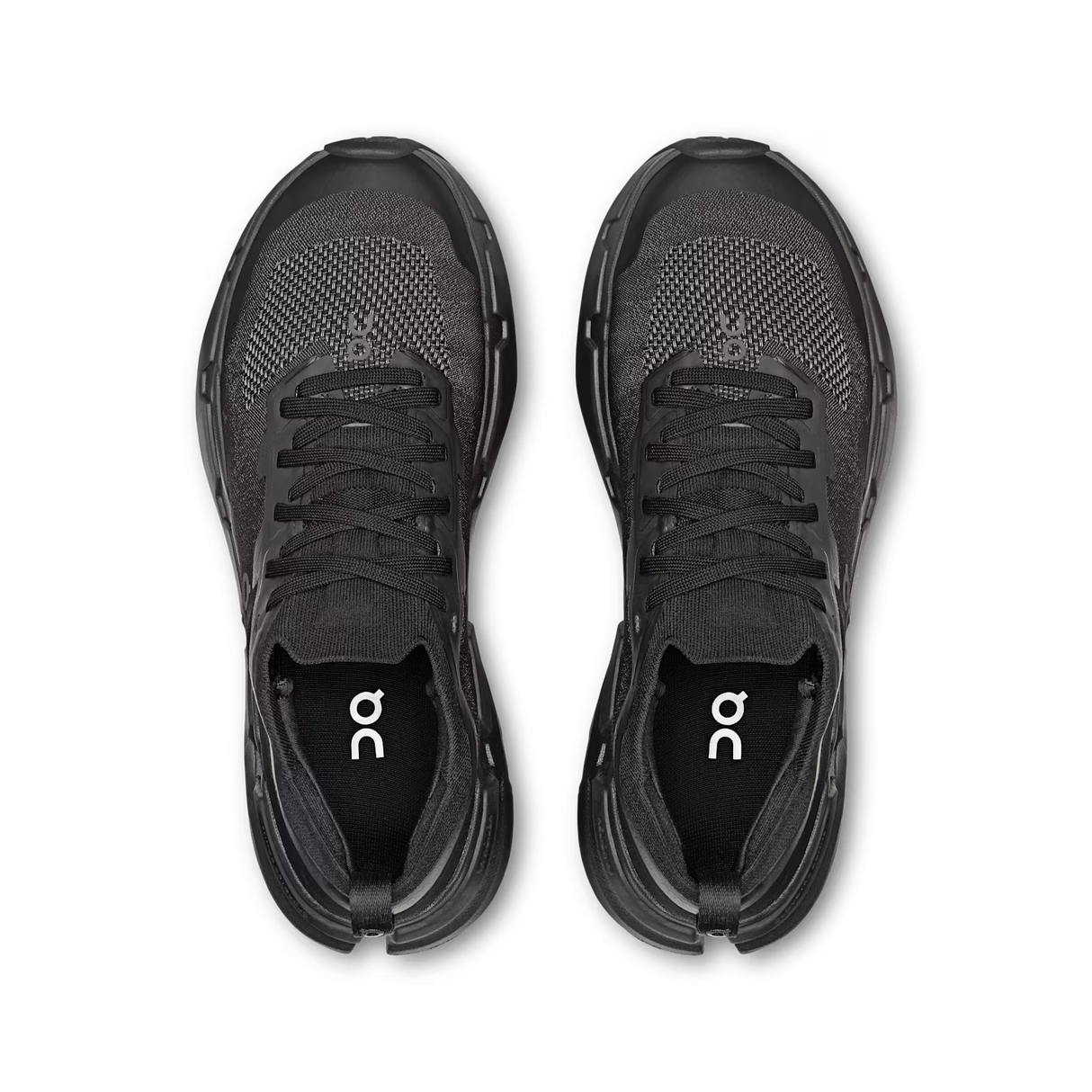 A pair of black On running shoes shown from a top-down view on a clean white background. - On Cloudsoma Shoes (Women's) - Black/black