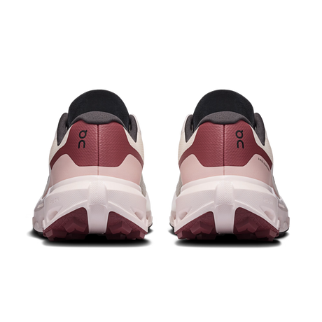 A pair of running shoes shown from the rear, featuring a color-blocked design in dusty rose, cream, and black. The 'on' logo is visible on the heel counter. - On Cloudvista 3 Shoes (Women's) - Oyster/Barberry