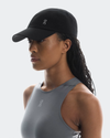 Woman wearing a black cap and gray tank top on a white background - On Lightweight Cap - Black