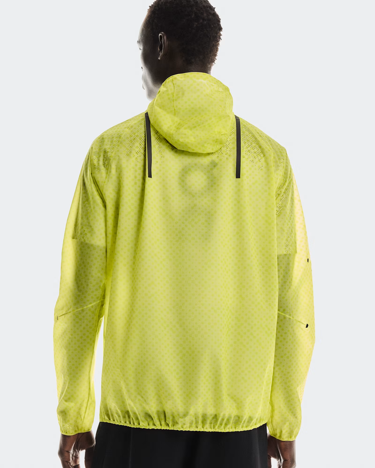 Person wearing a bright yellow jacket on a white background - On Ultra Jacket (Men's) - Limelight/Lime
