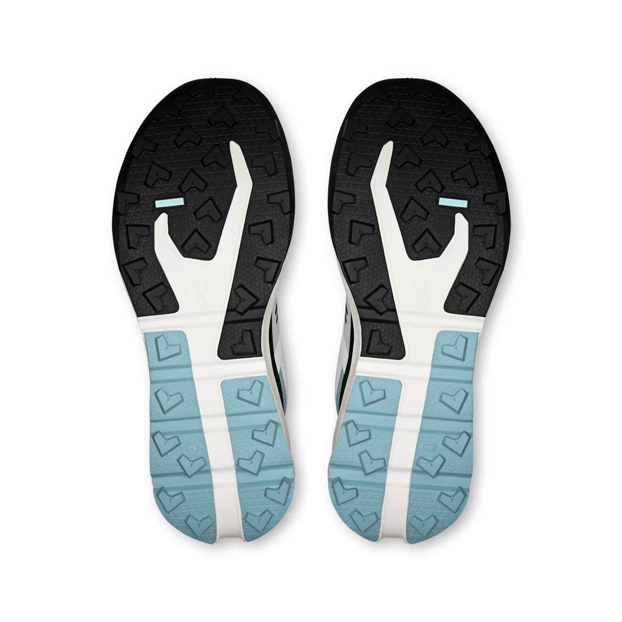 Top-down view of a pair of athletic shoes showing their black, white, and light blue outsoles on a plain white background. - On Cloudvista 3 Shoes (Men's) - Ivory/Wash