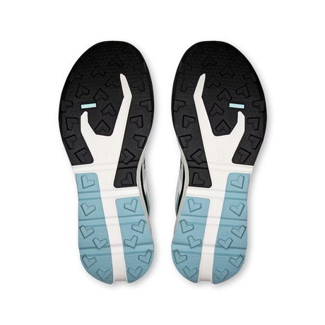 Top-down view of a pair of athletic shoes showing their black, white, and light blue outsoles on a plain white background. - On Cloudvista 3 Shoes (Men's) - Ivory/Wash