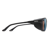 Black Smith sunglasses with a square-shaped lens and a reflective blue-to-orange mirrored finish, shown from a side profile on a white background. - Smith Embark Sunglasses - Matte Black | ChromaPop Glacier Photochromic Copper Blue Mirror