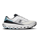 A side profile view of an On Cloudrunning shoe in white, black, and light blue. The shoe features a white mesh upper with black overlays, a black logo, and a light blue heel accent, set against a clean white background. - On Cloudvista 3 Shoes (Men's) - Ivory/Wash