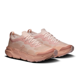 A pair of light pink and peach sneakers with a chunky, sculpted sole, shown against a solid black background. - On Cloudsoma Shoes (Women's) - Doe/Argil