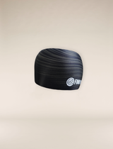 Black and green patterned Training Headband product with Find Your Feet logo on a beige background