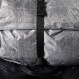 Close-up of a gray bag with a black strap - Hyperlite Mountain Gear Pemi 15 Backpack