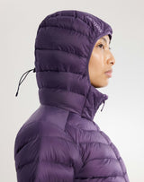 A side profile of a person wearing a purple hooded puffer jacket against a light gray studio background. The brand name 'ARC'TERYX' is visible in white on the hood. - Arc'teryx Cerium Hoody (Women's) - Moondrop
