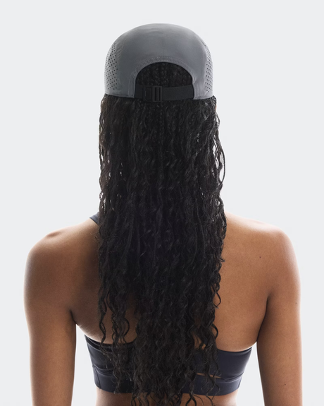 Person wearing a gray cap with a long black ponytail on a white background - On Lightweight Cap - Rock
