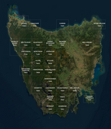 satellite map of Tasmania with mountain ranges labeled on a dark background label with Tasmap 1:50000 Topographic/Cadastral Maps TasMap