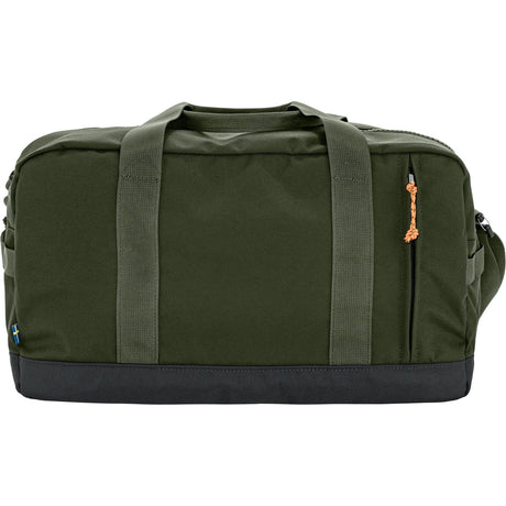 Green duffel bag with black base on a white background - Fjällräven Vardag Duffel 33L - Deep Forest