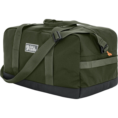 Green duffel bag with a visible brand logo on a white background - Fjällräven Vardag Duffel 33L - Deep Forest